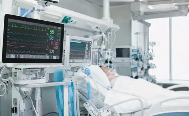 Medical application image showing patient monitor, MRI scanner and portable diagnostic device