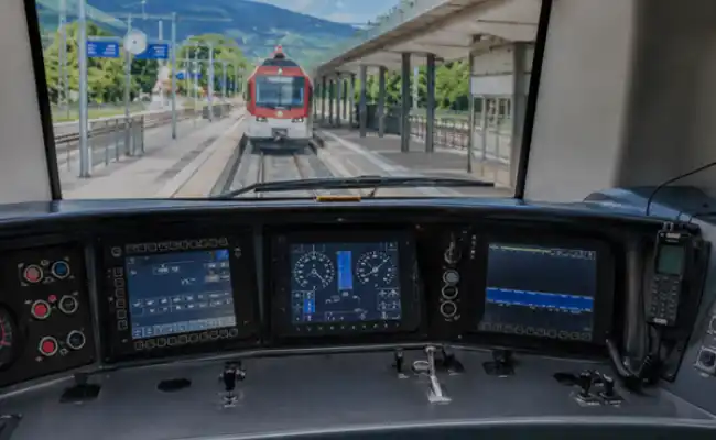 Railway application image displaying a high-speed train, signal tower and trackside electronics cabinet